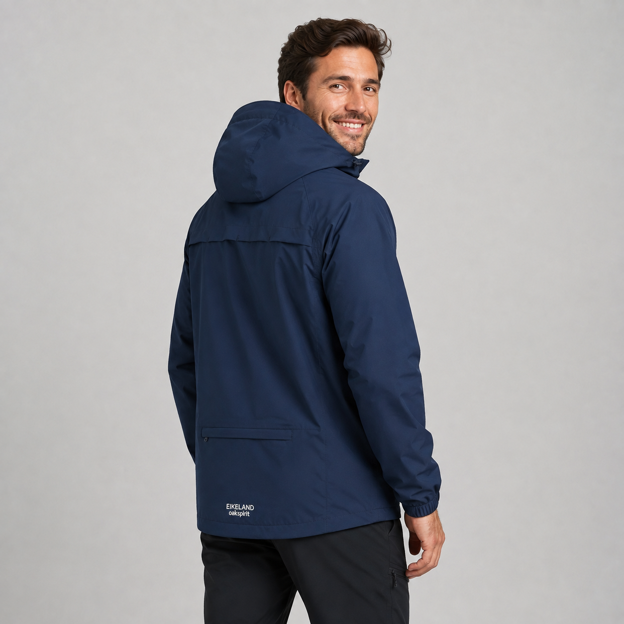 Men's hooded lightweight rain shell jacket, side view