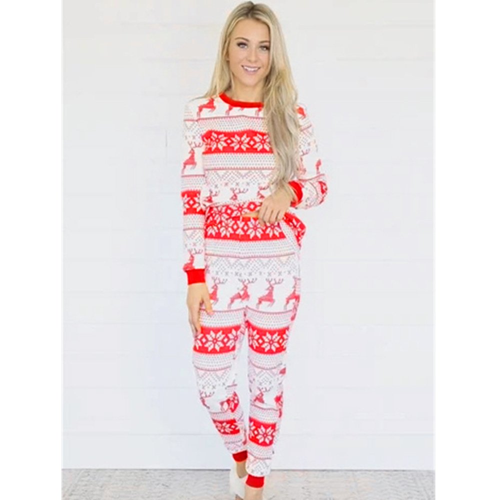 Family matching Christmas pyjamas in red and white reindeer and snowflake print - view 11