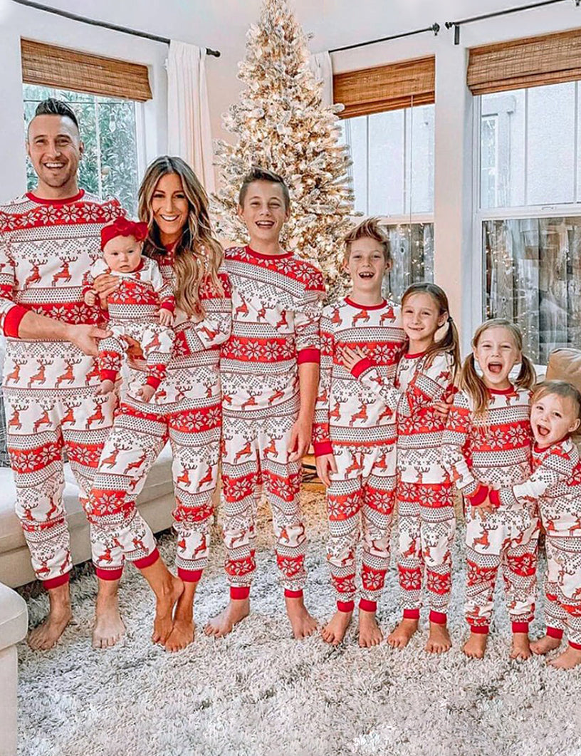 Family matching Christmas pyjamas in red and white reindeer and snowflake print - view 12