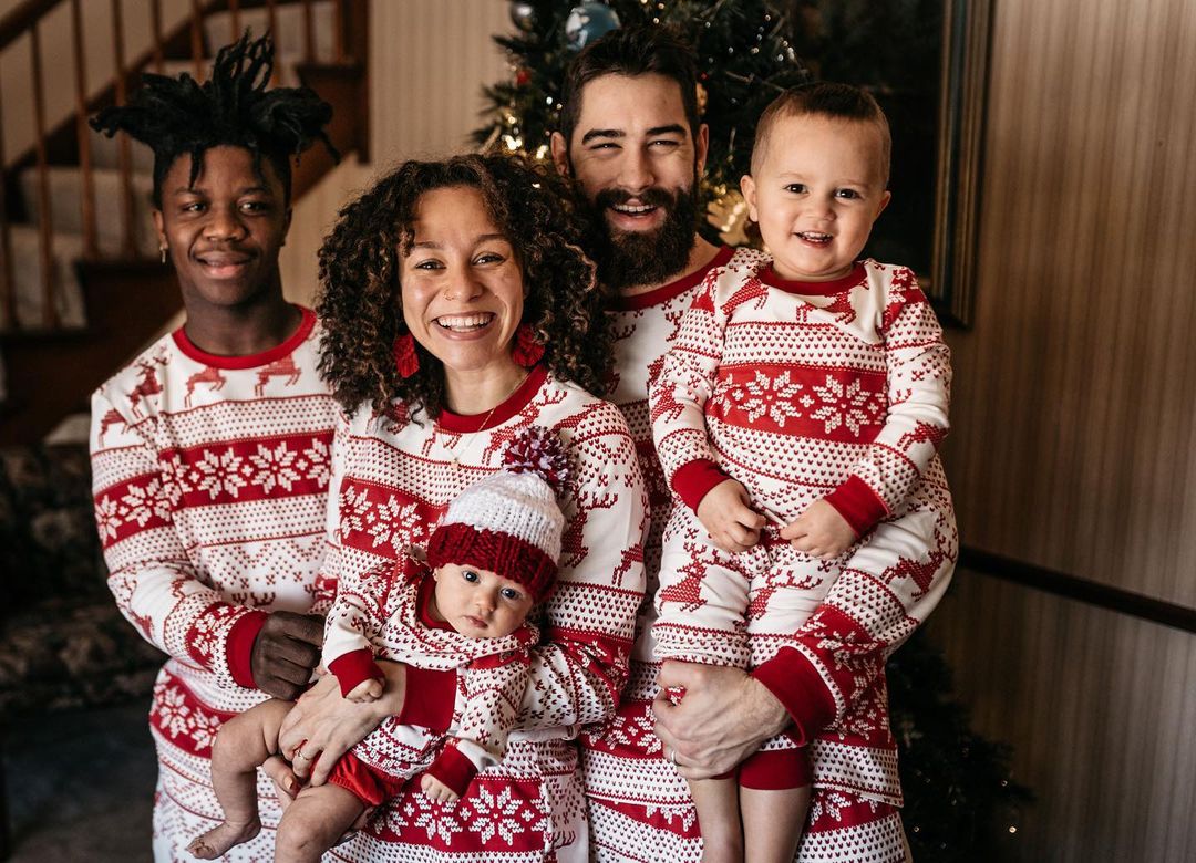 Family matching Christmas pyjamas in red and white reindeer and snowflake print - view 3