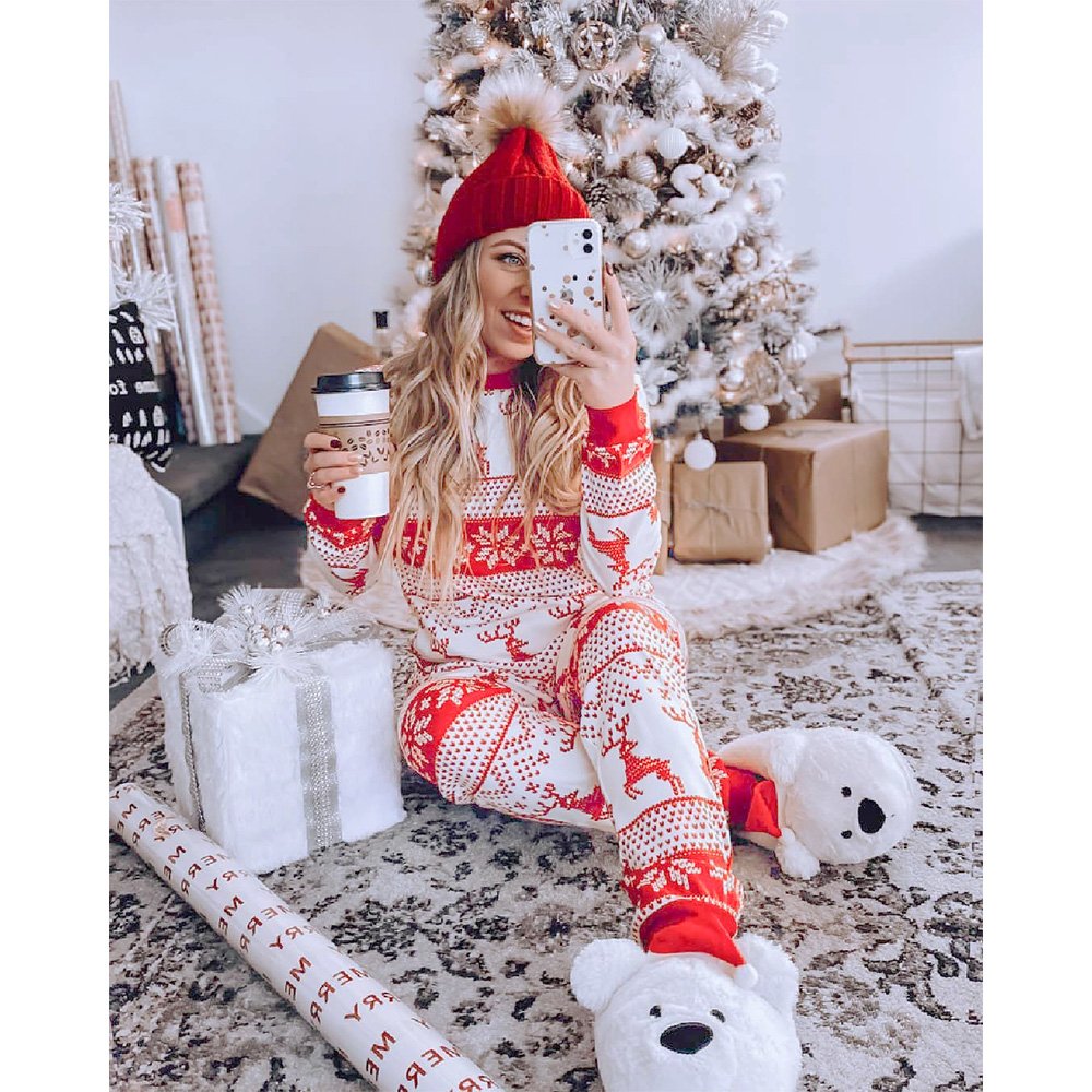 Family matching Christmas pyjamas in red and white reindeer and snowflake print - view 4