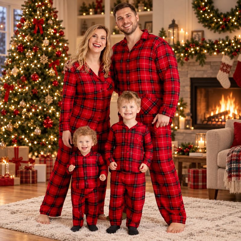 Man in red plaid flannel-look button-up Christmas pajamas