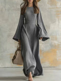 Holiday maxi dress with deep bell sleeves and ribbed texture