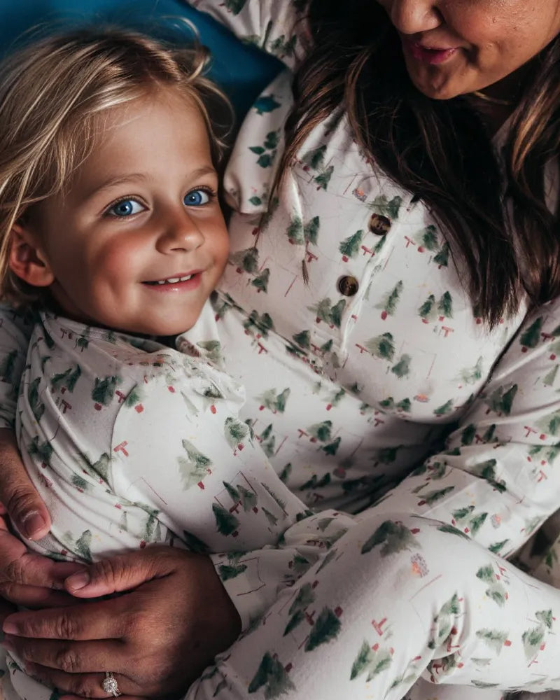 Matching family Christmas pyjamas with green watercolour pine tree print on white - view 2