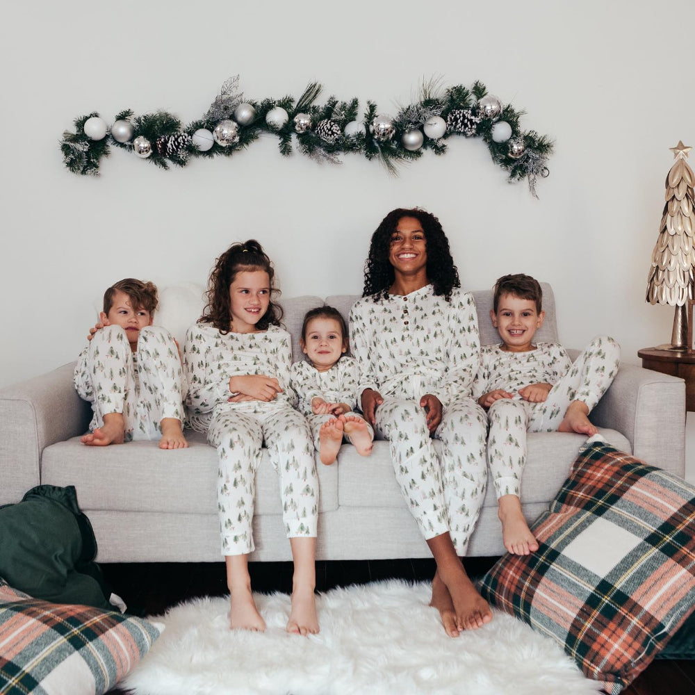 Matching family Christmas pyjamas with green watercolour pine tree print on white - view 3