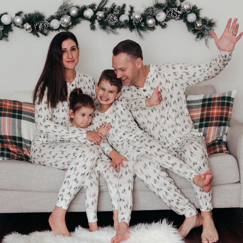 Matching family Christmas pyjamas with green watercolour pine tree print on white - view 5