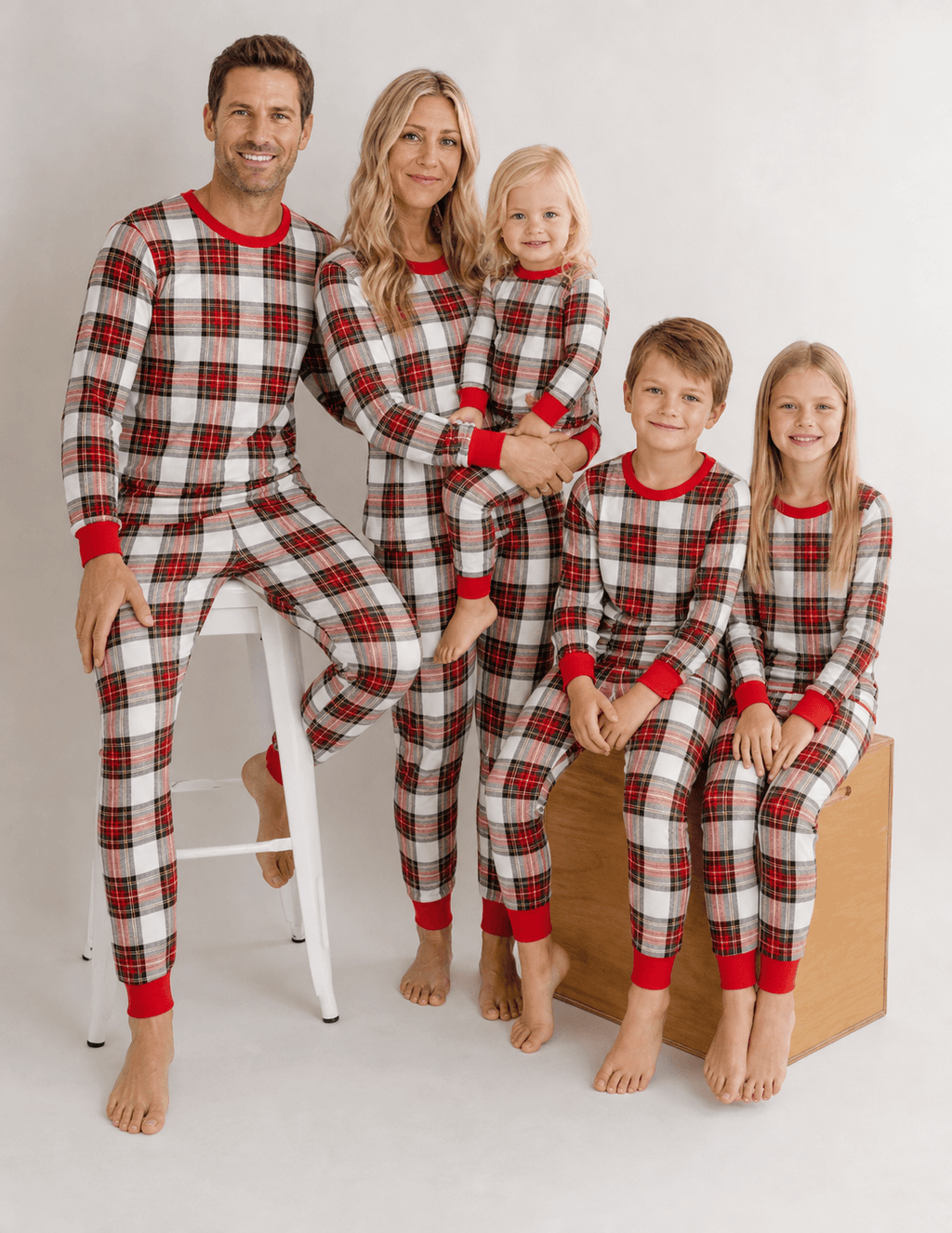 Matching family Christmas pyjamas in red and cream tartan check with red ribbed cuffs - view 3