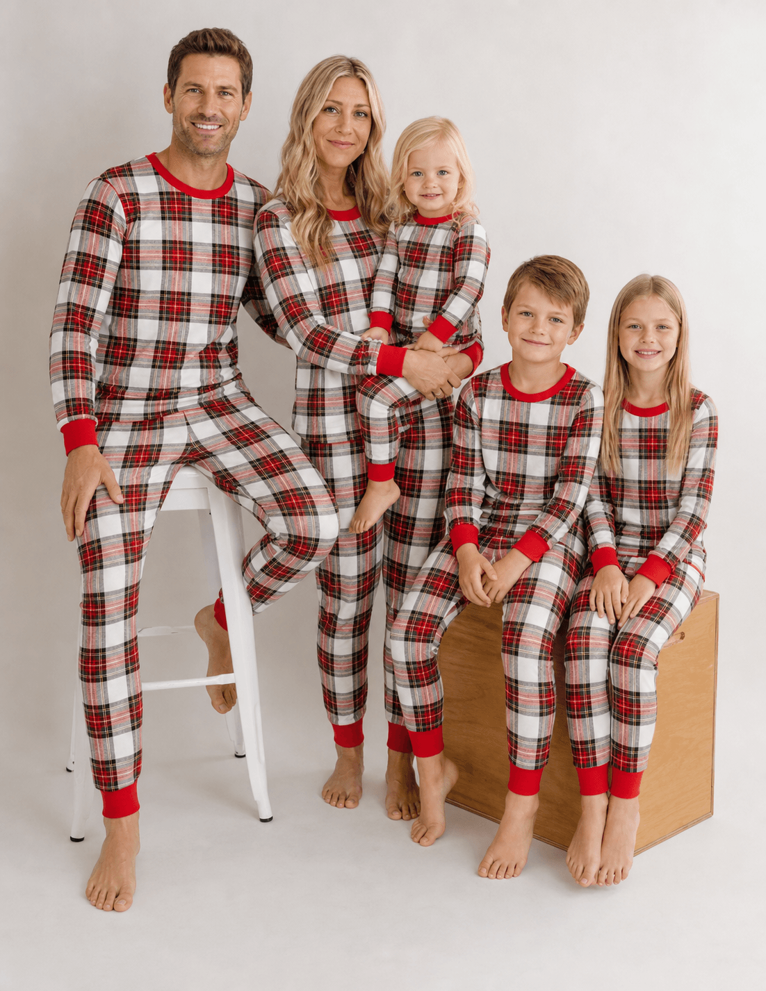 Matching family Christmas pyjamas in red and cream tartan check with red ribbed cuffs - view 3