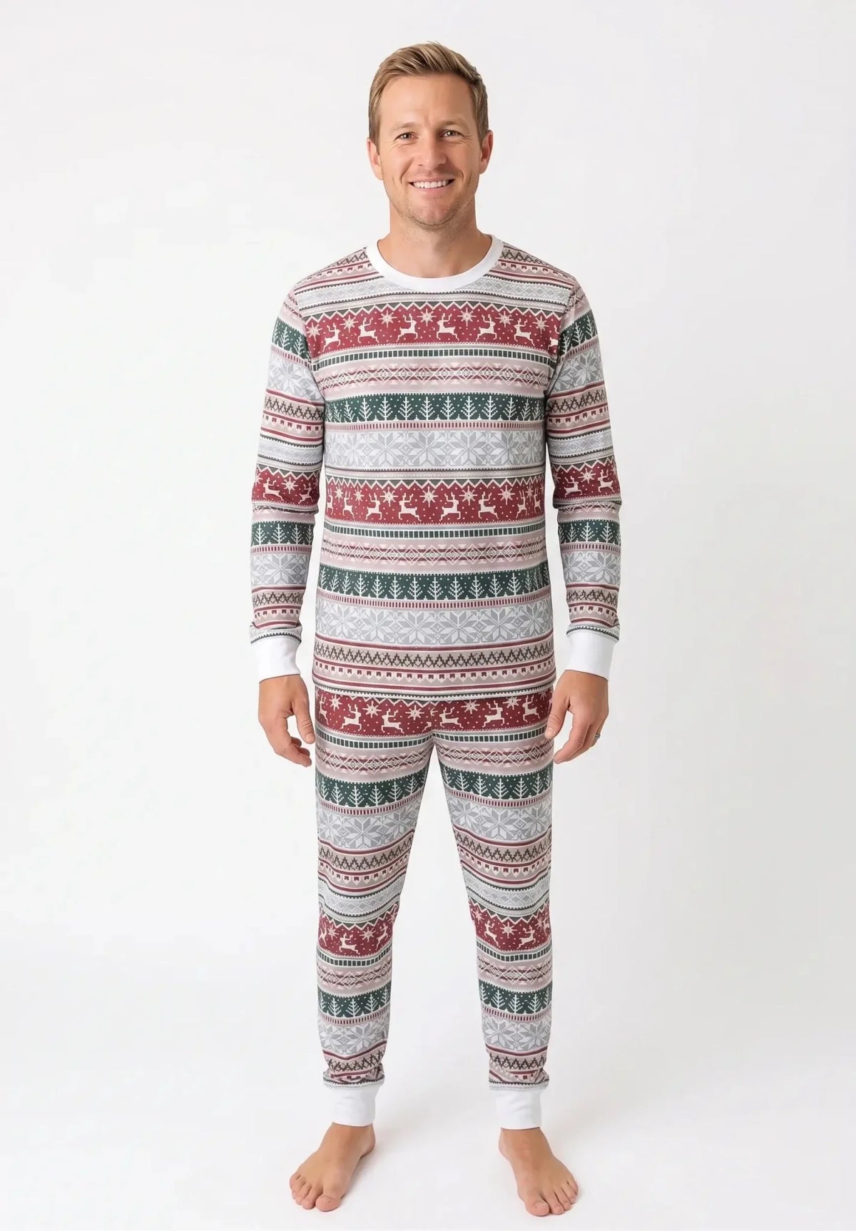 Family wearing matching Fair Isle Christmas pyjamas with reindeer and snowflake print - view 9