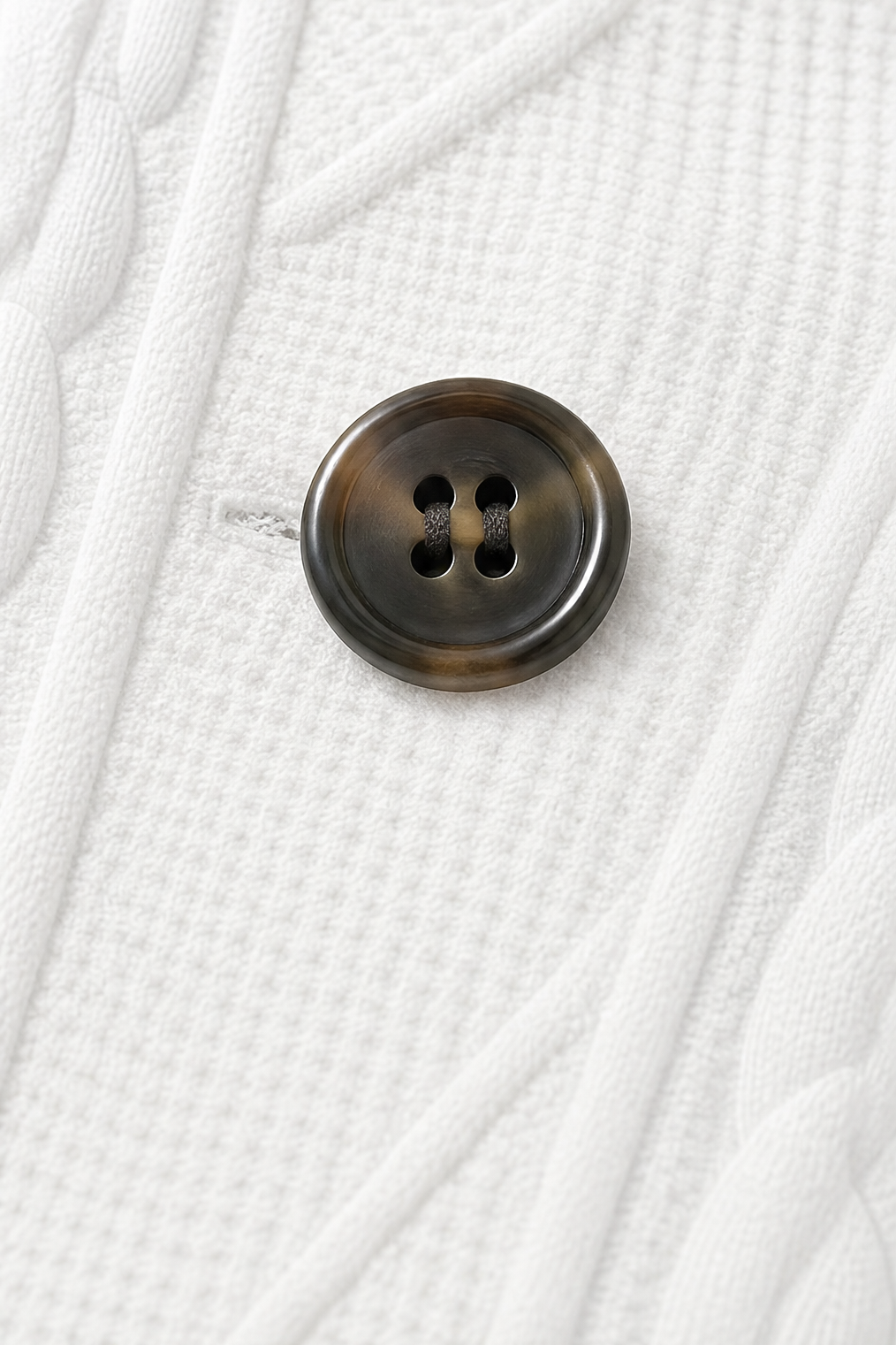 White button front textured blazer with stand collar worn over a white top - view 8