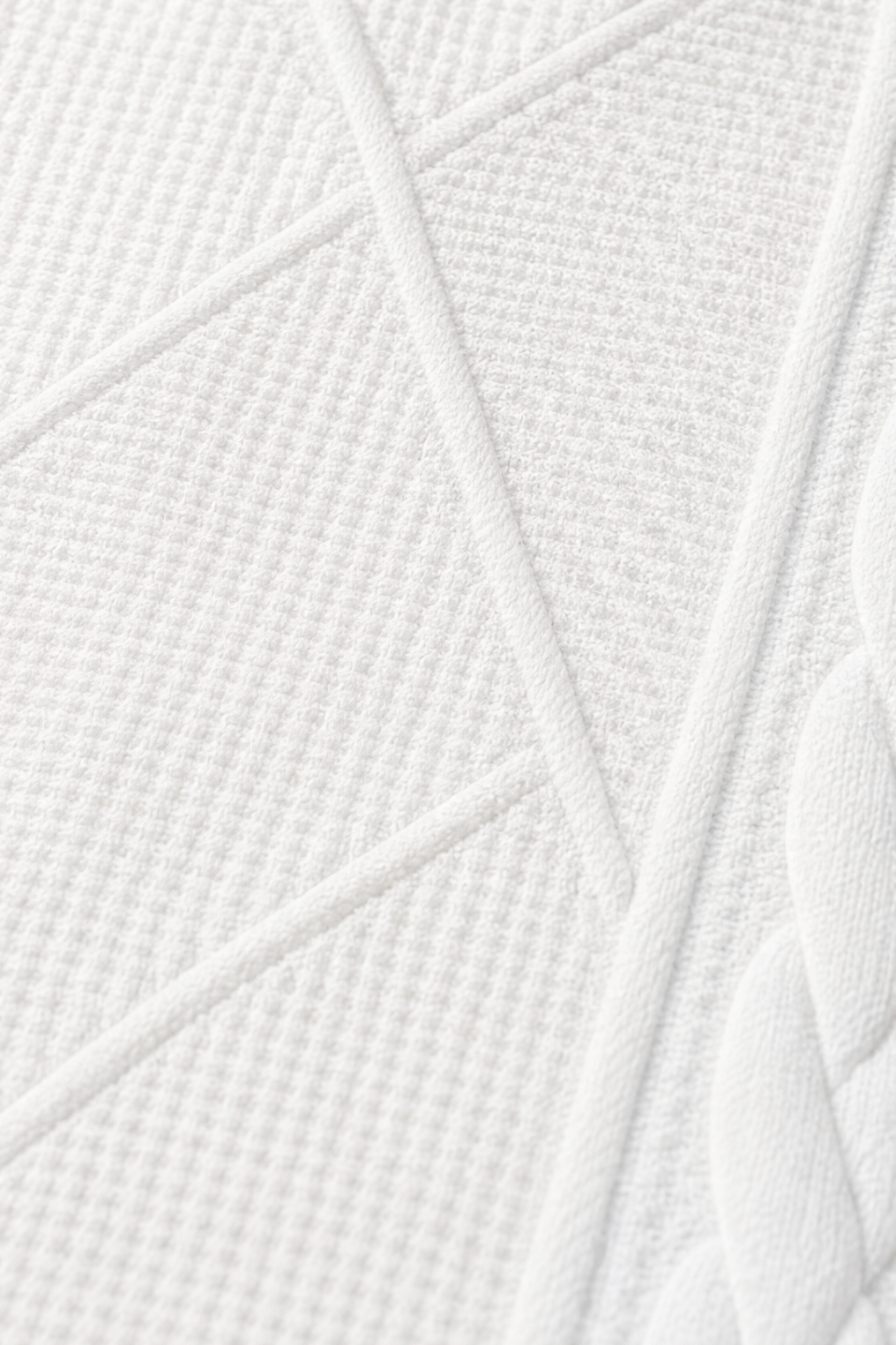 White button front textured blazer with stand collar worn over a white top - view 9