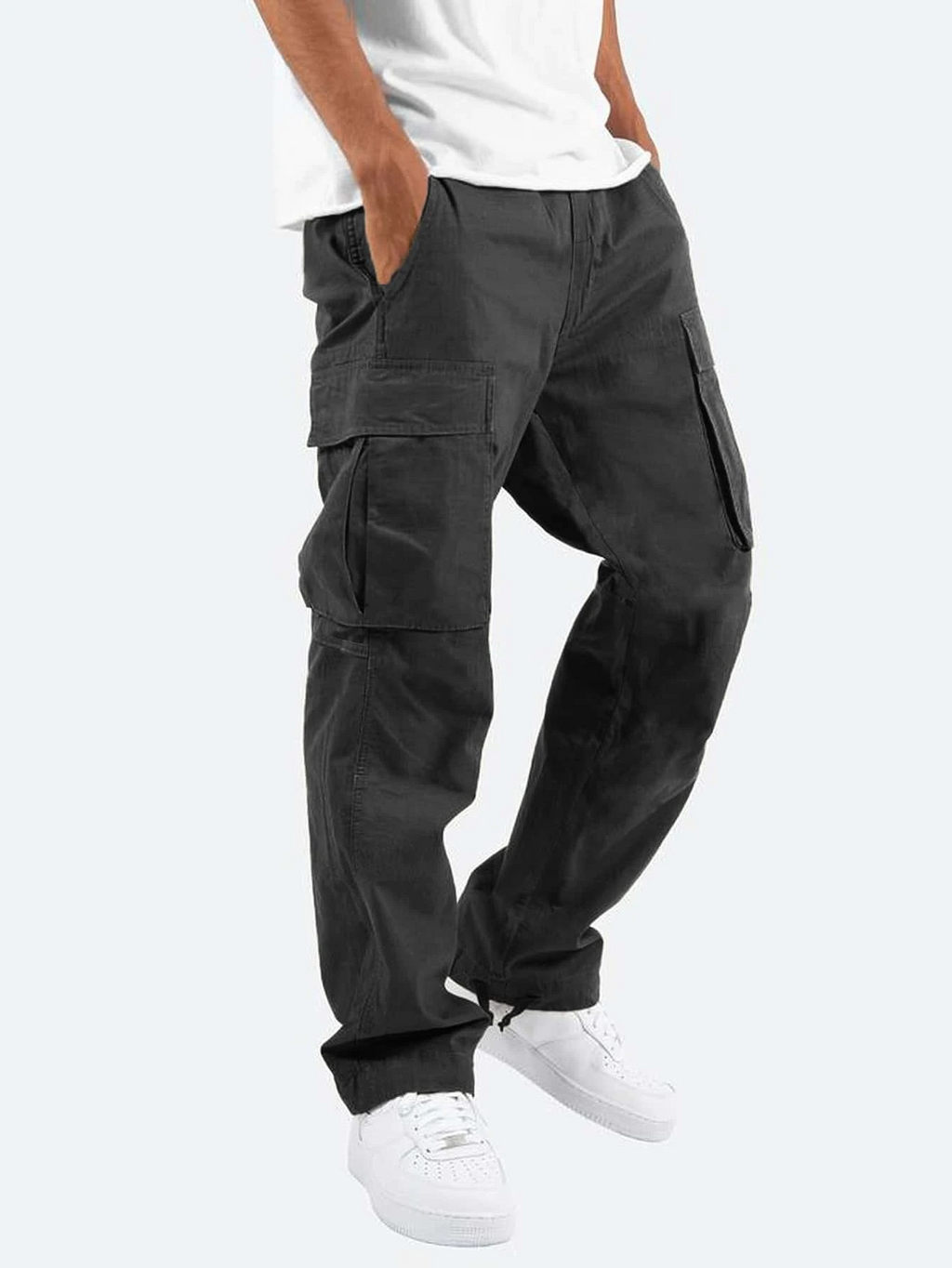 Relaxed fit mens cargo trousers with thigh flap pockets and drawcord hems, worn with a white tee and white trainers - view 2