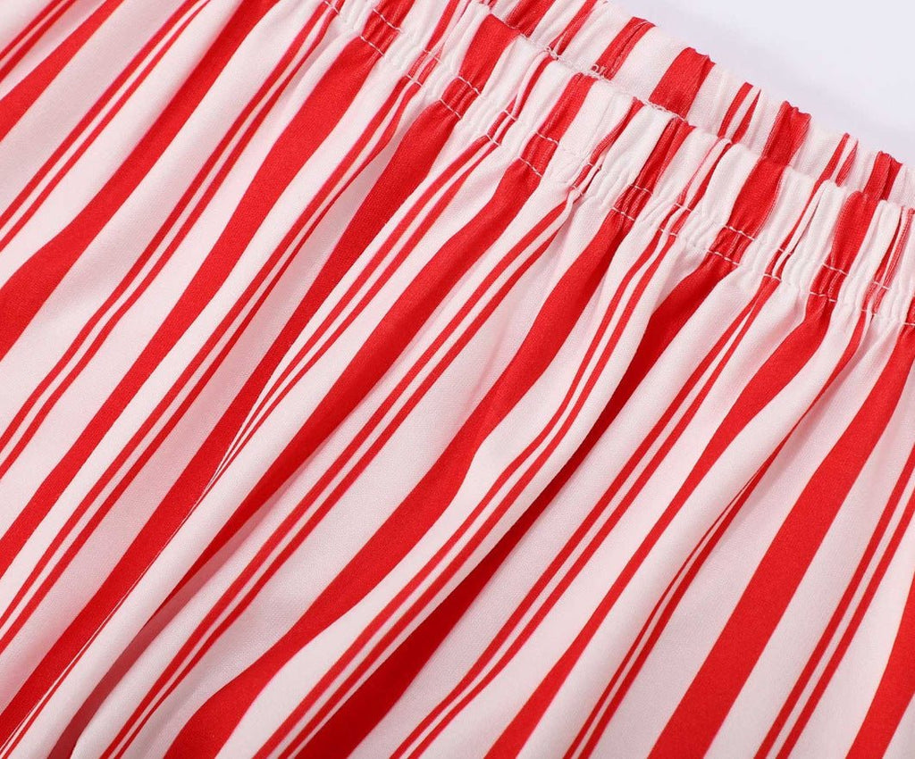 Red and white candy stripe matching family Christmas pyjamas with green piping - view 14