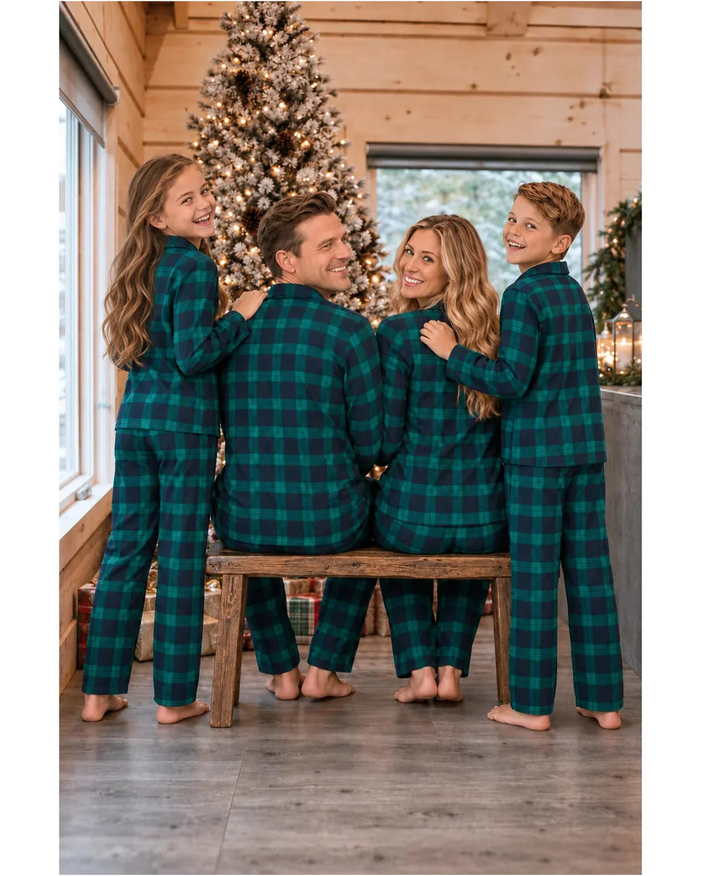 Family wearing matching green and navy tartan flannel Christmas pyjamas - view 16