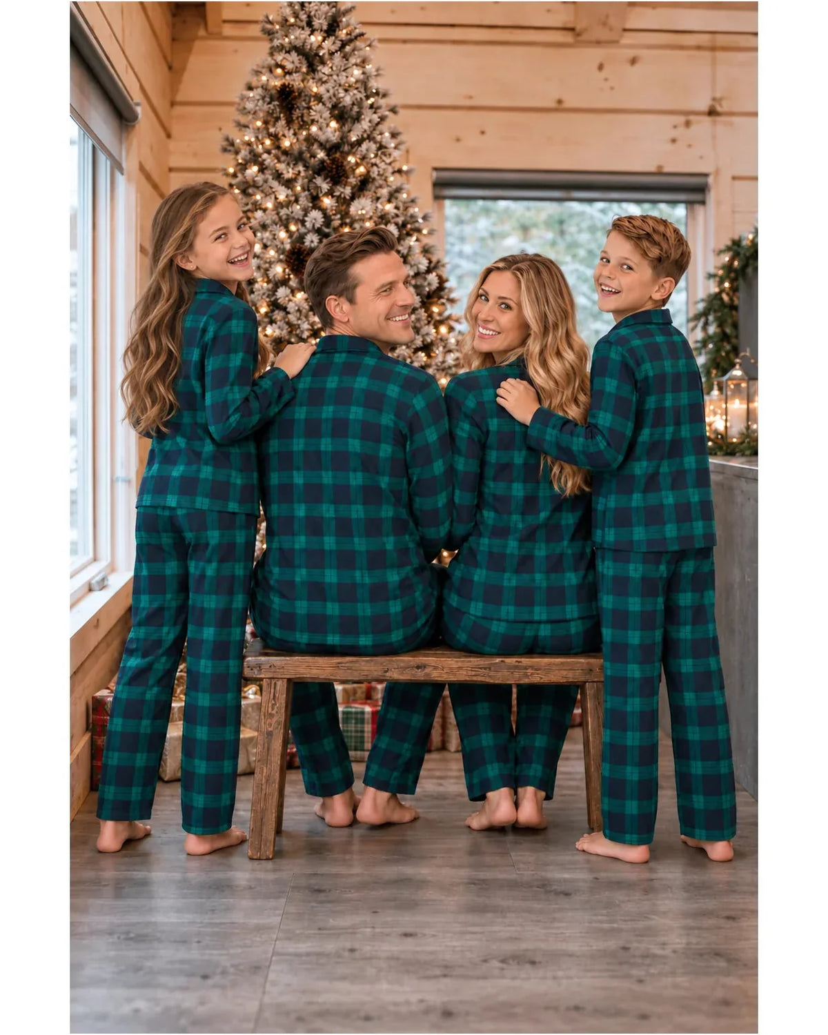 Family wearing matching green and navy tartan flannel Christmas pyjamas - view 16