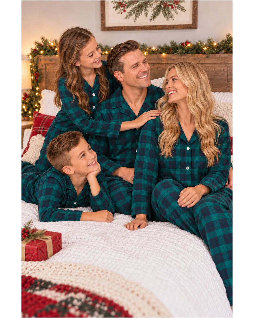 Family wearing matching green and navy tartan flannel Christmas pyjamas - view 5