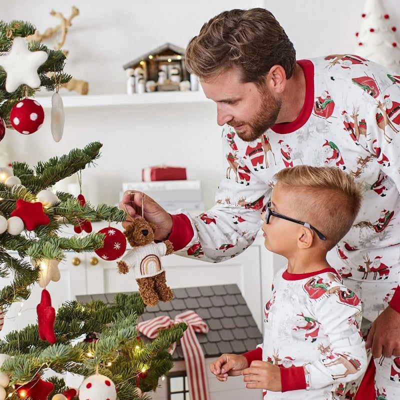 Matching family Christmas pyjamas with reindeer and Santa sleigh print and red ribbed trims - view 8
