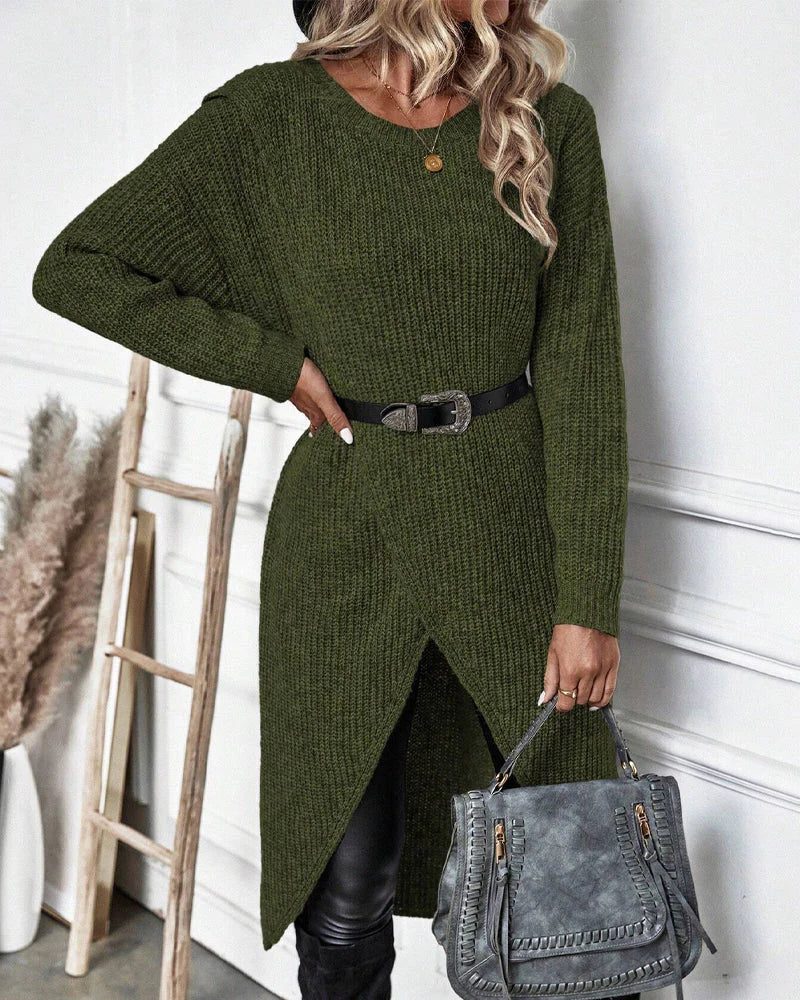 Woman wearing a ribbed knit midi sweater dress with a wrap front and split hem, styled with leggings and knee high boots - view 2