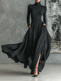 Long sleeve black turtleneck and pleated maxi skirt set with slit