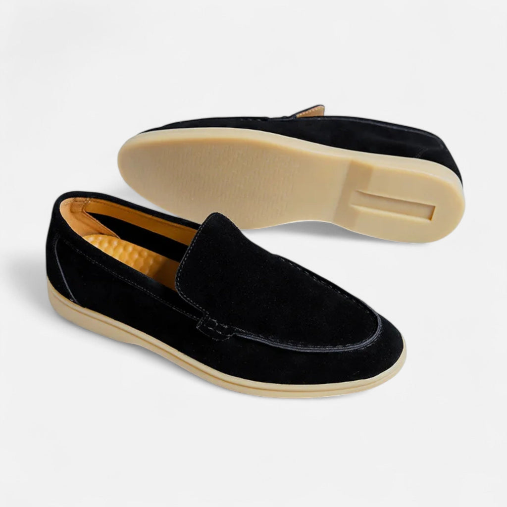 Men's black faux suede slip-on loafer with moc-toe stitching and gum-tone sole