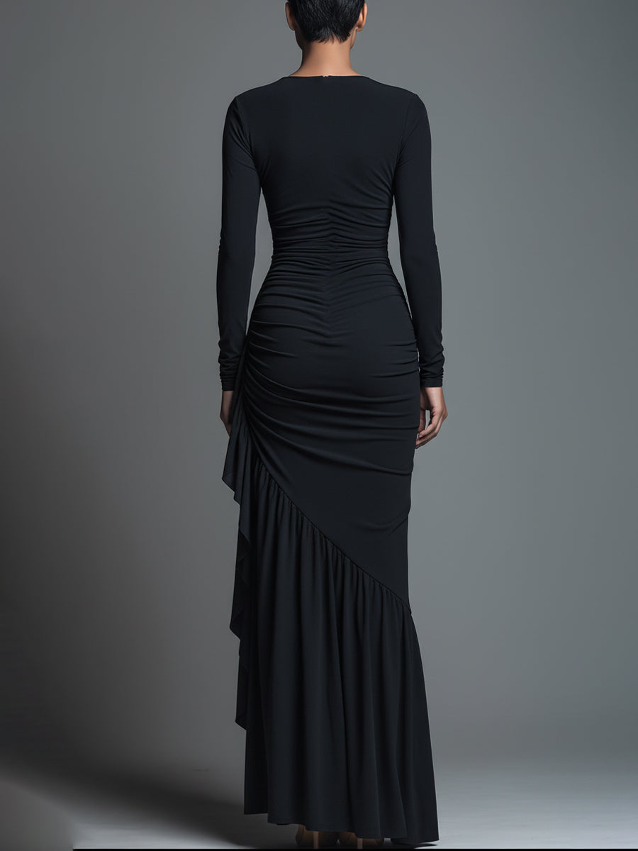 Woman in a black long sleeve knit maxi dress with ruched waist - view 6