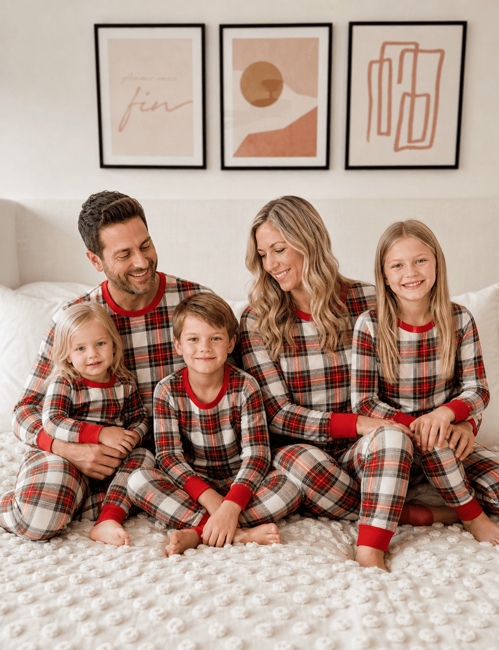 Family wearing matching cream and red tartan Christmas pyjamas with red ribbed cuffs - view 16