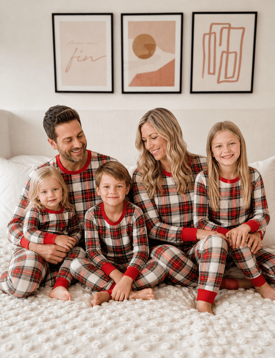 Family wearing matching cream and red tartan Christmas pyjamas with red ribbed cuffs - view 16
