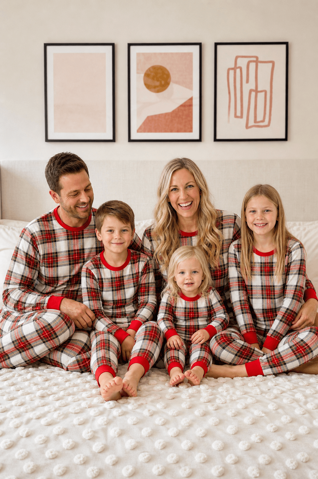Family wearing matching cream and red tartan Christmas pyjamas with red ribbed cuffs - view 6