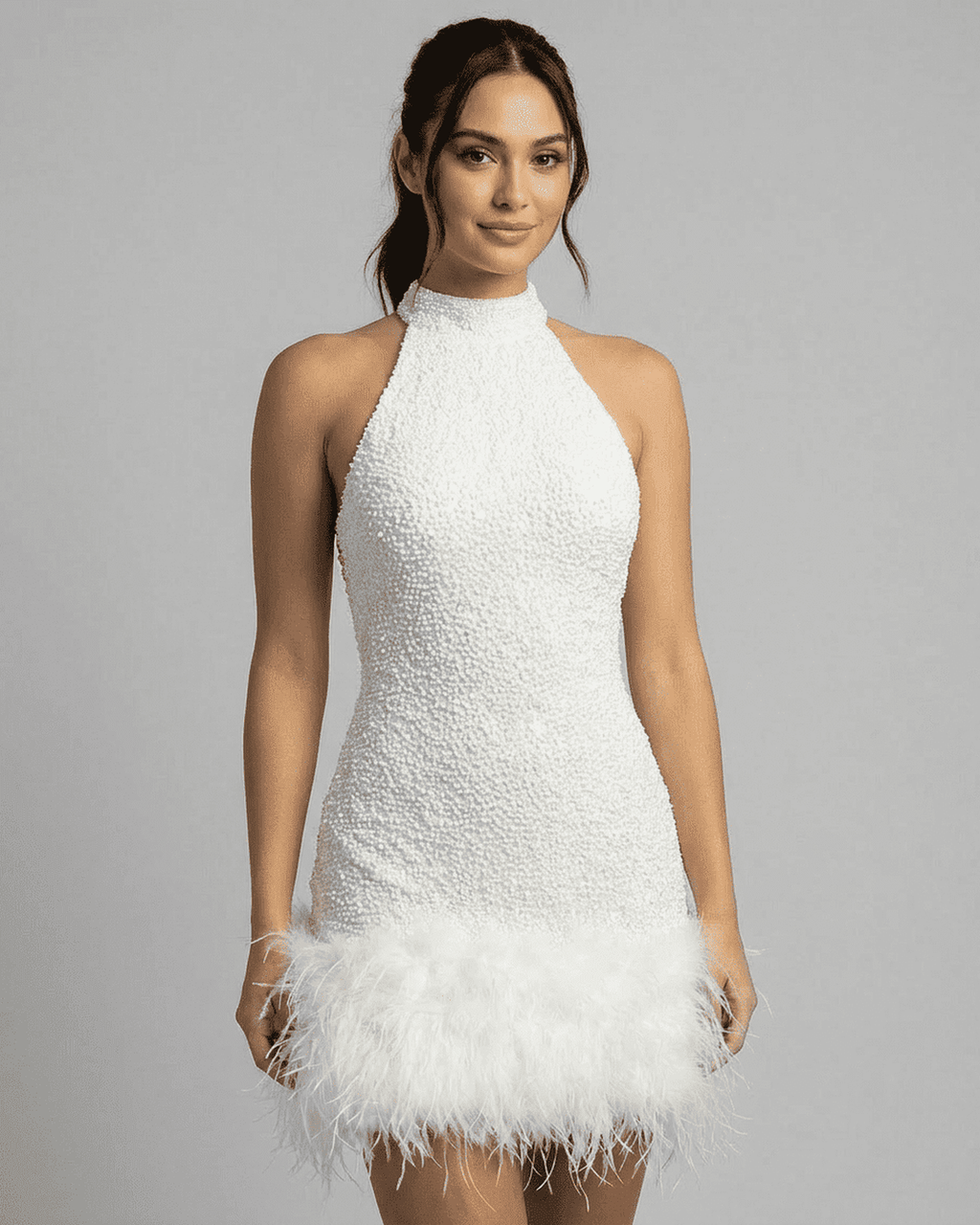 White halter neck sequin bodycon mini dress with feather trim hem