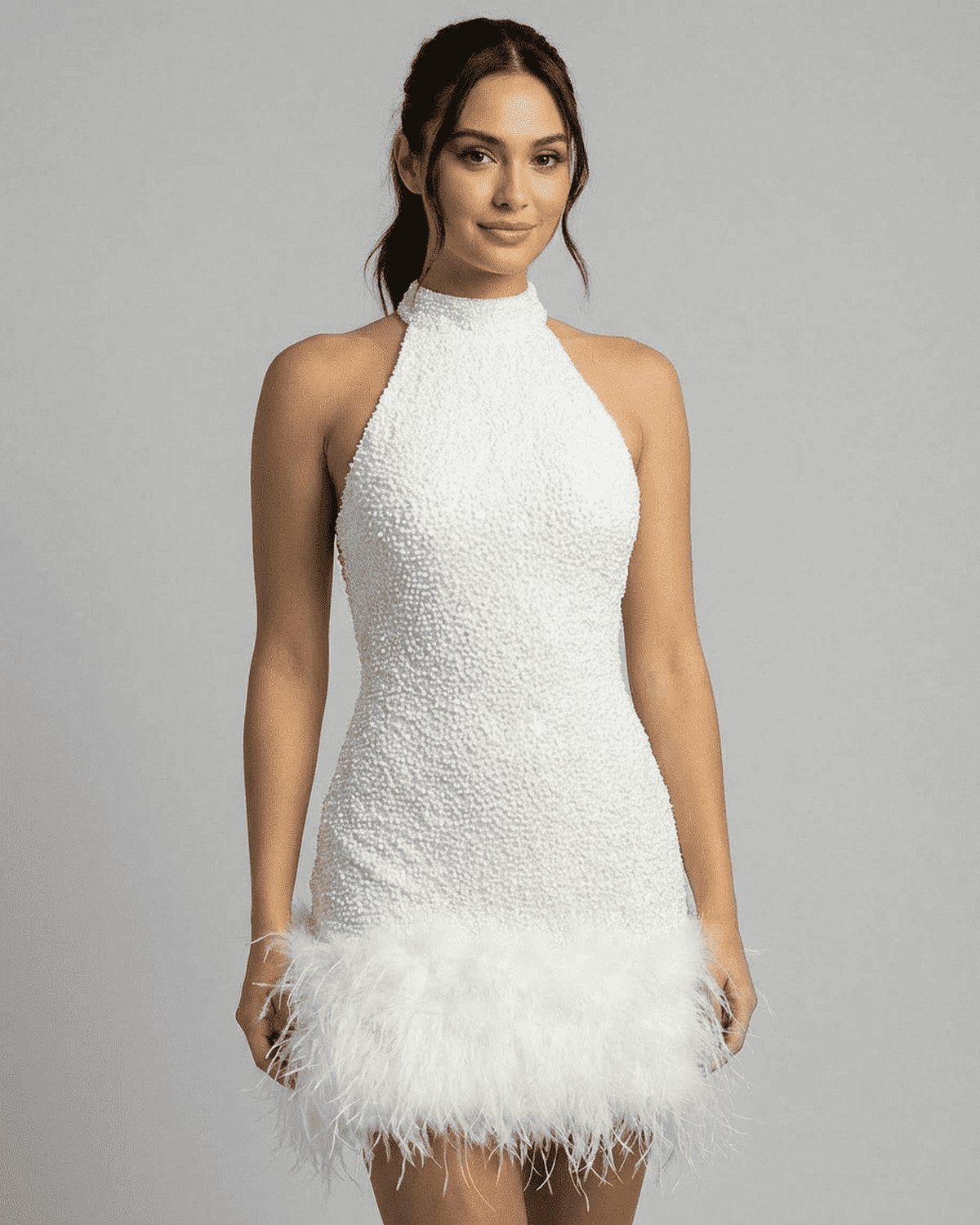 White halter neck sequin bodycon mini dress with feather trim hem