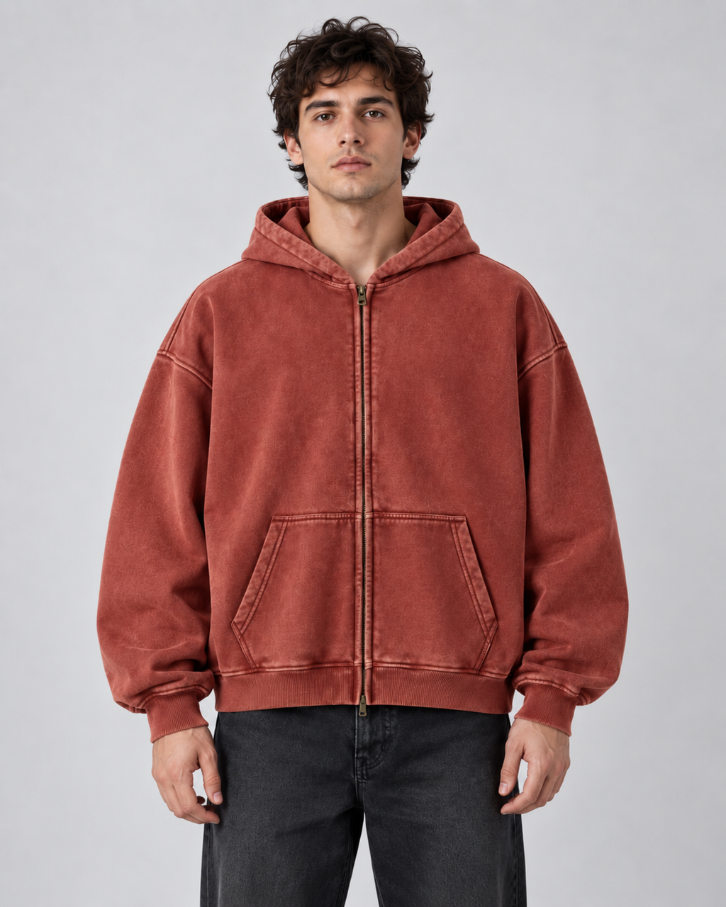 Man wearing an oversized washed zip up hoodie with kangaroo pocket and ribbed cuffs - view 2