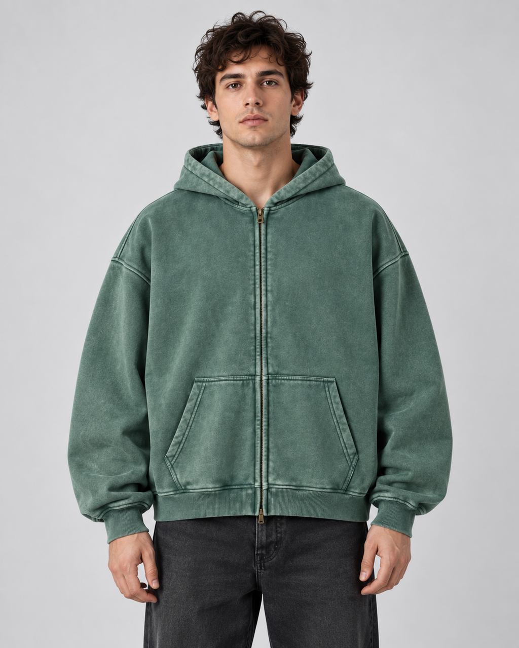 Man wearing an oversized washed zip up hoodie with kangaroo pocket and ribbed cuffs - view 4