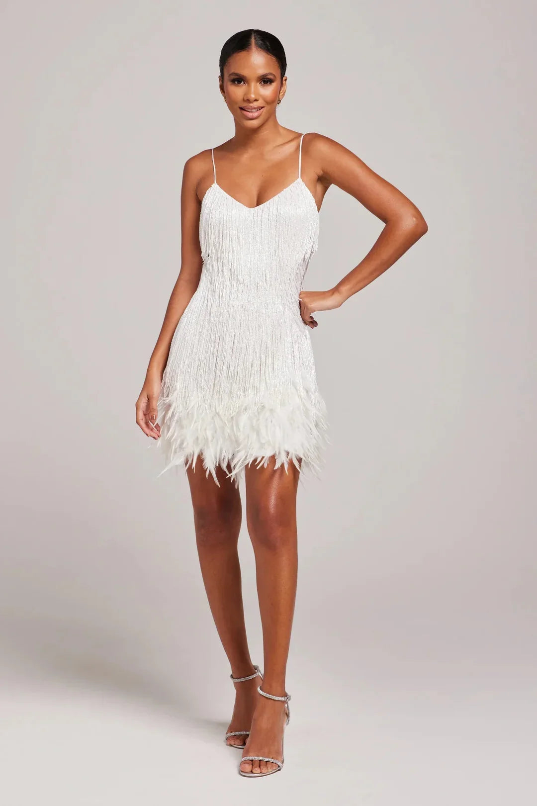 Fringe mini dress with feather-trim hem and spaghetti straps